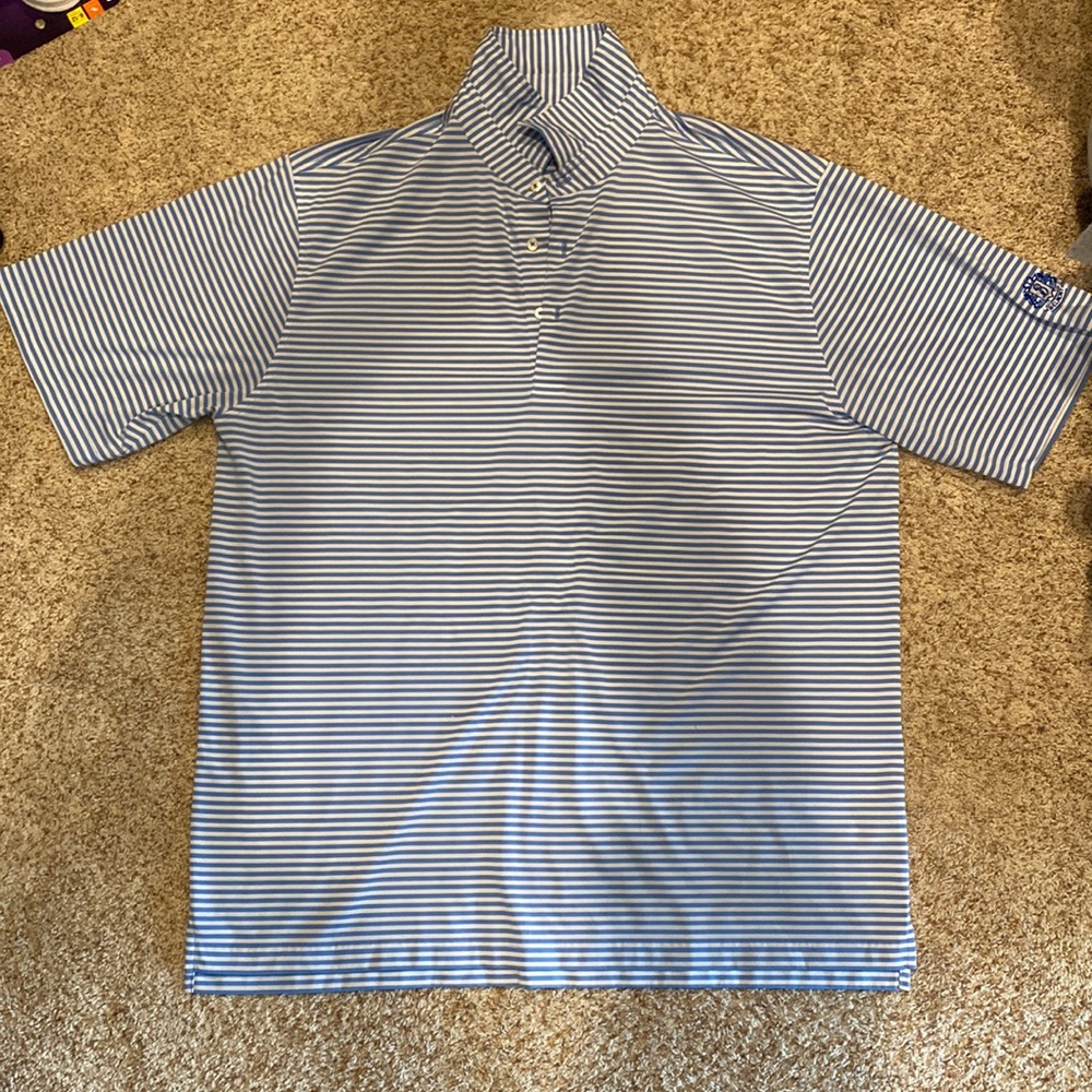 blue and white striped collared golf shirt